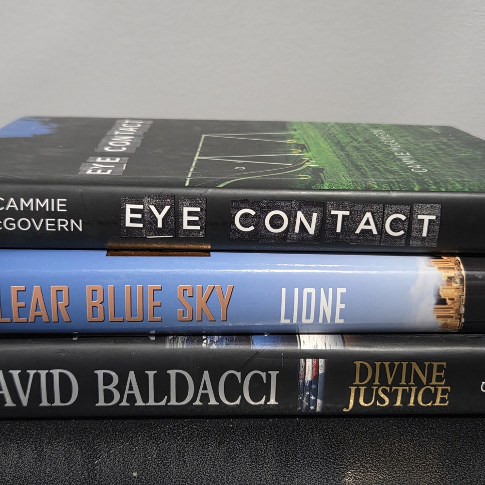 Trio of Hardcover Books with Bold Titles